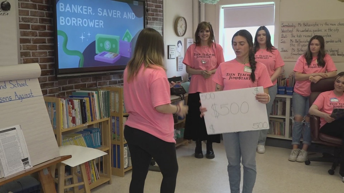 Hermon High School students teach fourth graders about money [Video]